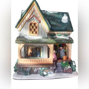 Festive Green and White Holiday Village House